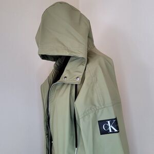 Calvin Klein Jeans Solid Monogram Logo Patch Hooded Rain Jacket